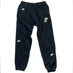 Nike Black Sweatpants with White and Green Logos